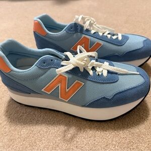 New Balance WOMENS 515H PLATFORM
SNEAKER